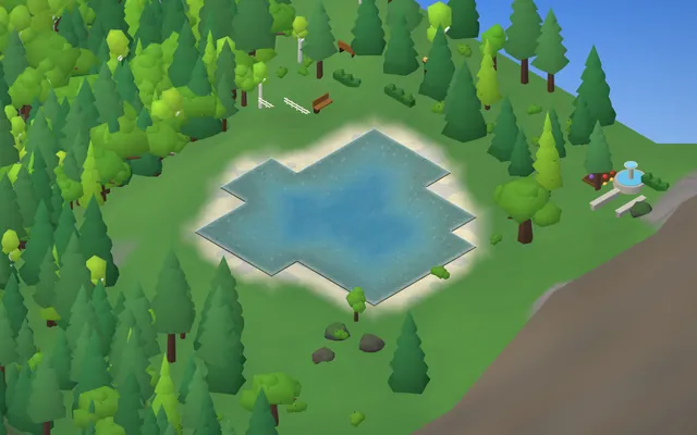 A pond dug on a level bench in summer, with a sand shore, boulders, a fountain, a fence, hedges and benches.