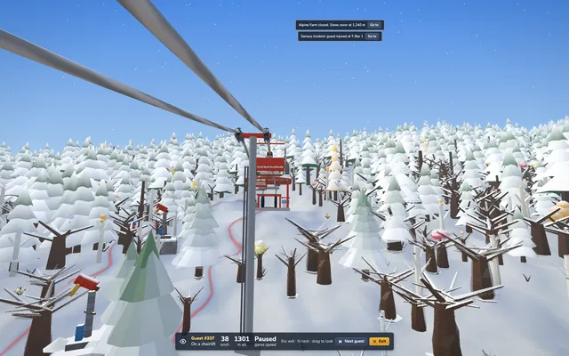 Looking out from a chairlift seat over the valley and the cable.